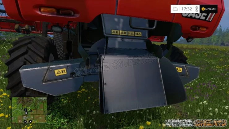 The spreader on the back of the harvester can be set to powder or lay hay/straw trails for making bales.